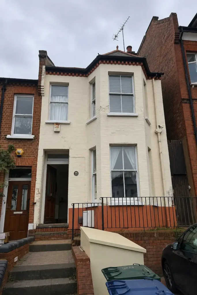 Victorian terraced house before brickwork restoration in London